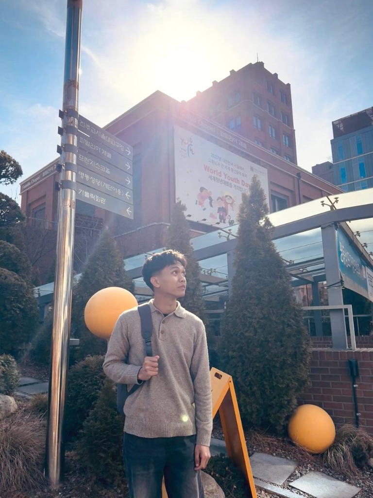 Aksara outdoors in sunlight