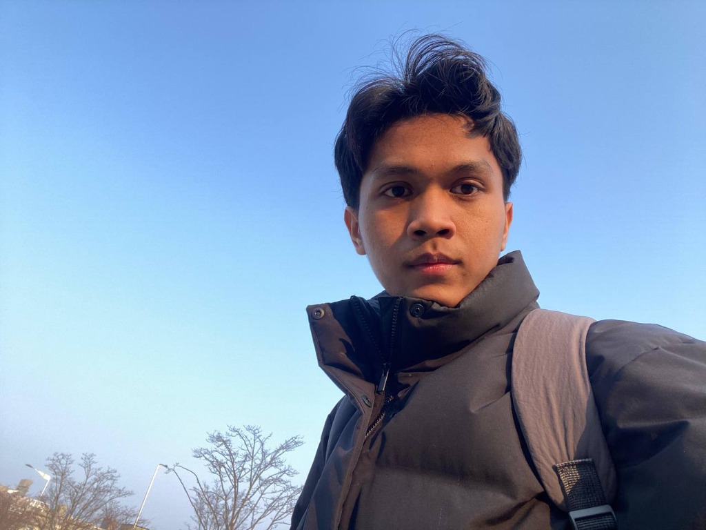 Aksara taking an outdoor selfie